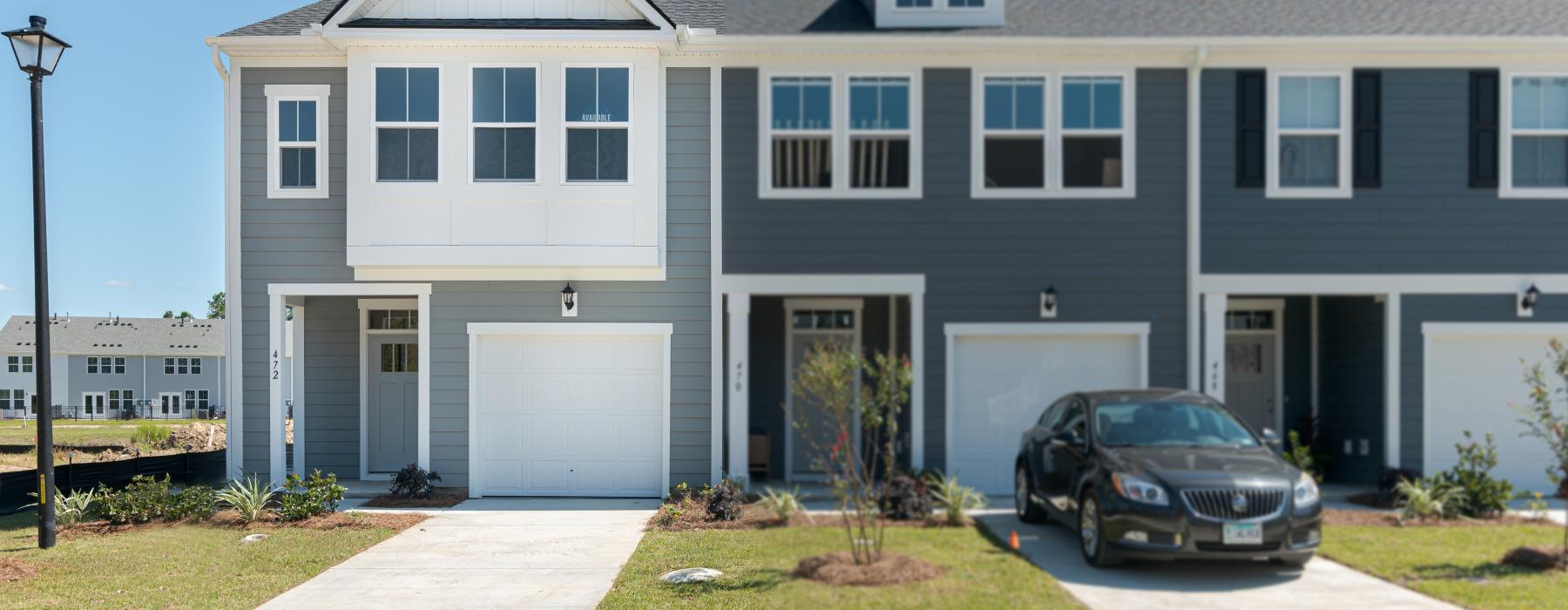 a car parked in front of a house